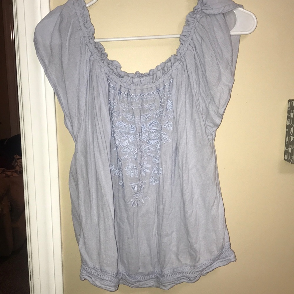 Off the shoulder, flattering blue shirt